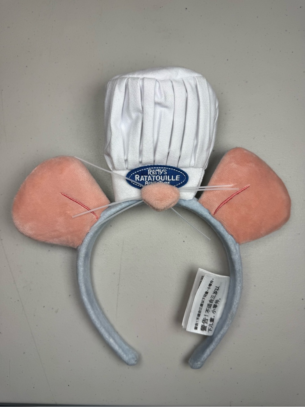 Disney Remy Ratatouille Mouse Ear Headband in White and Peach